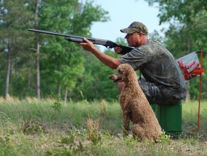 Rick in training with one of our poodles.